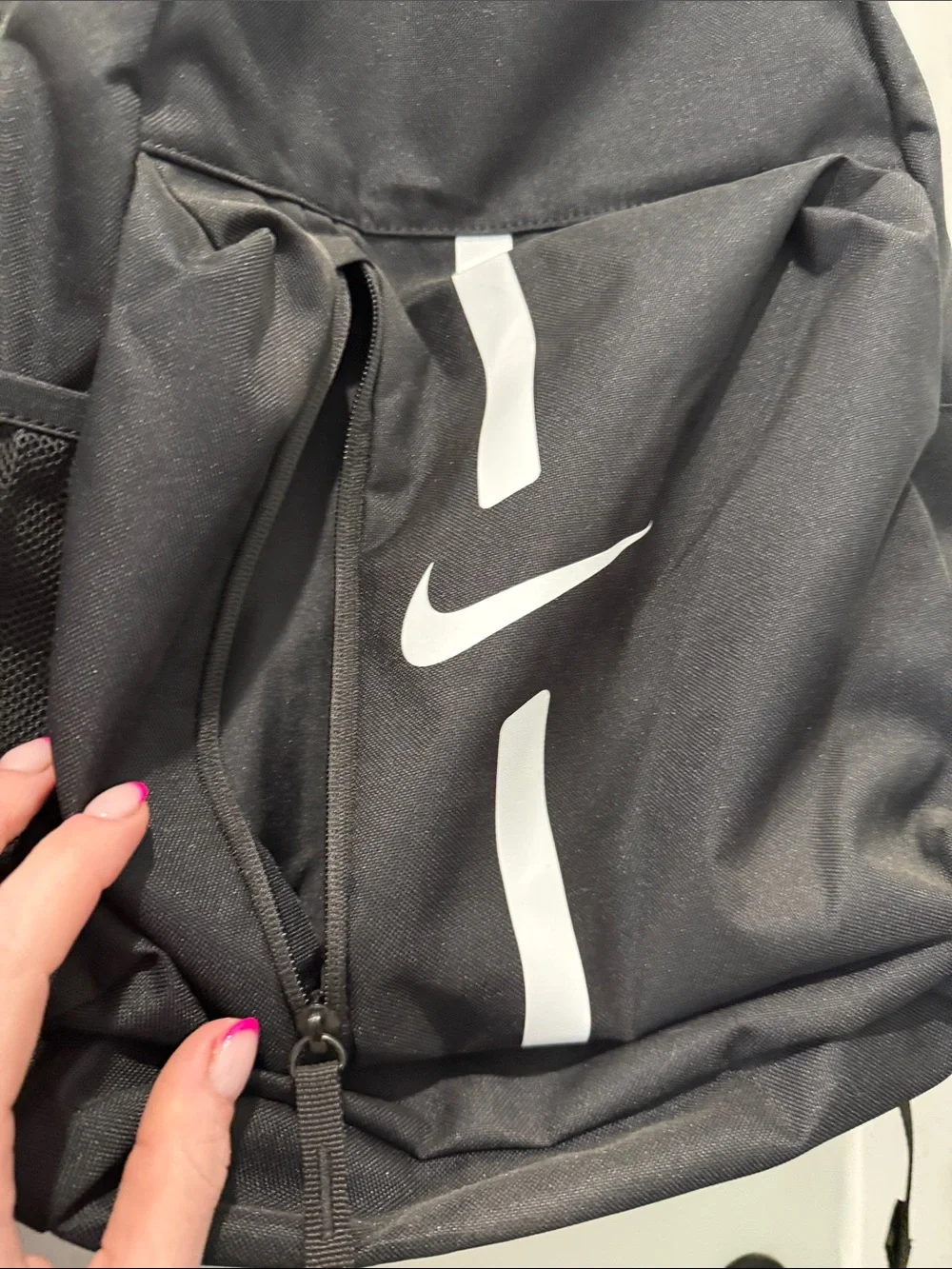 Nike Black Backpack with White Swoosh and Stripe